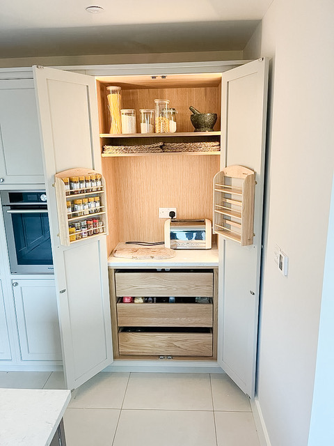 Bespoke kitchen larder unit with spice racks in St Neots Cambridgeshire by Cromwell Interiors