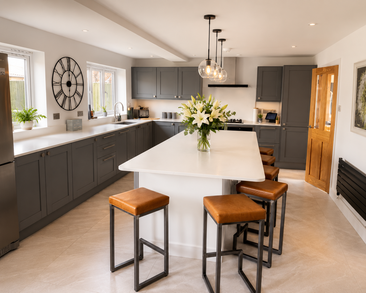 Bespoke grey shaker kitchen with island in St Ives Cambridgeshire by Cromwell Interiors