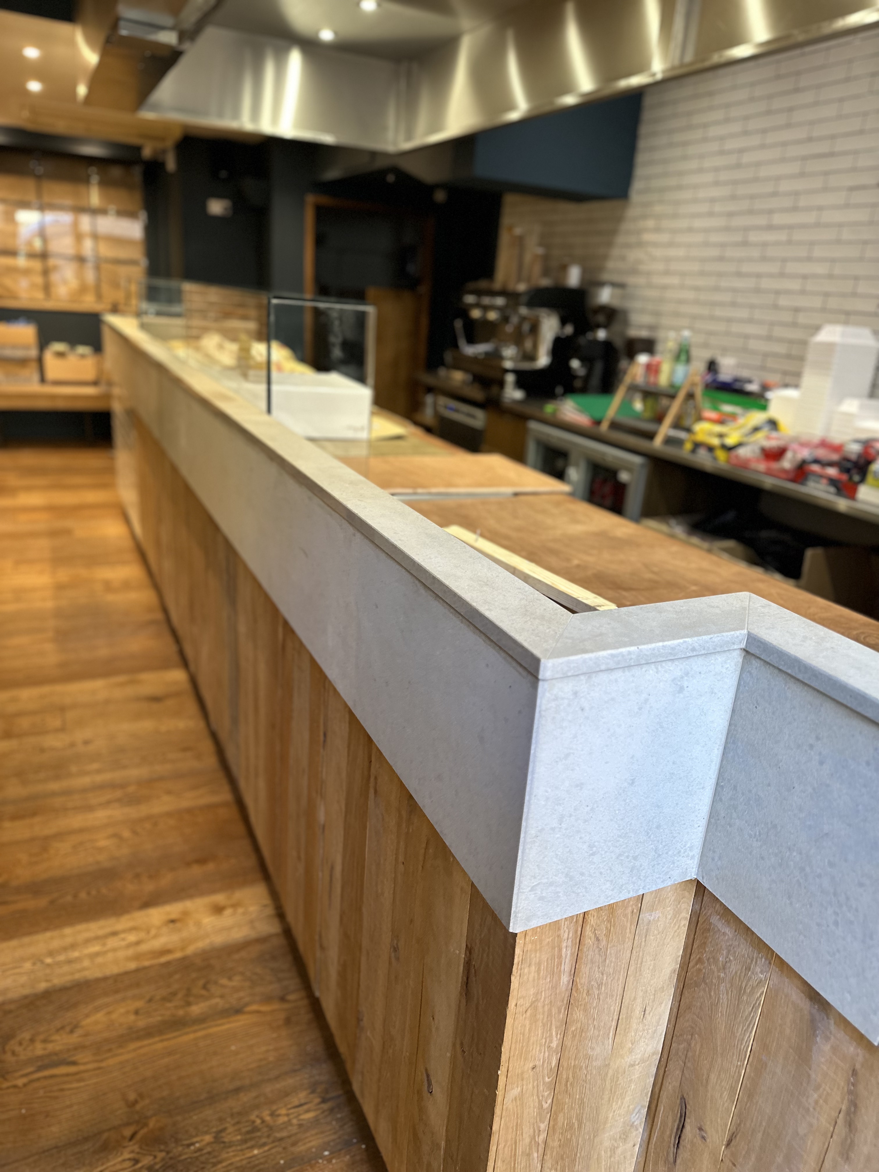 Bespoke commercial joinery counter in Cambridge by Cromwell Interiors